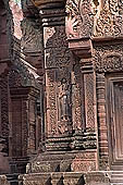 Banteay Srei temple - sculpted lintels and columns on the sides of the doors 